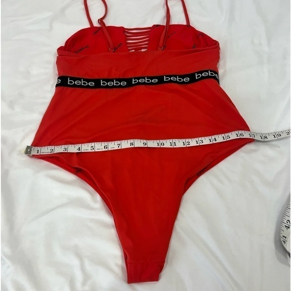 Bebe blood orange red swimsuit black band with logo size XL
